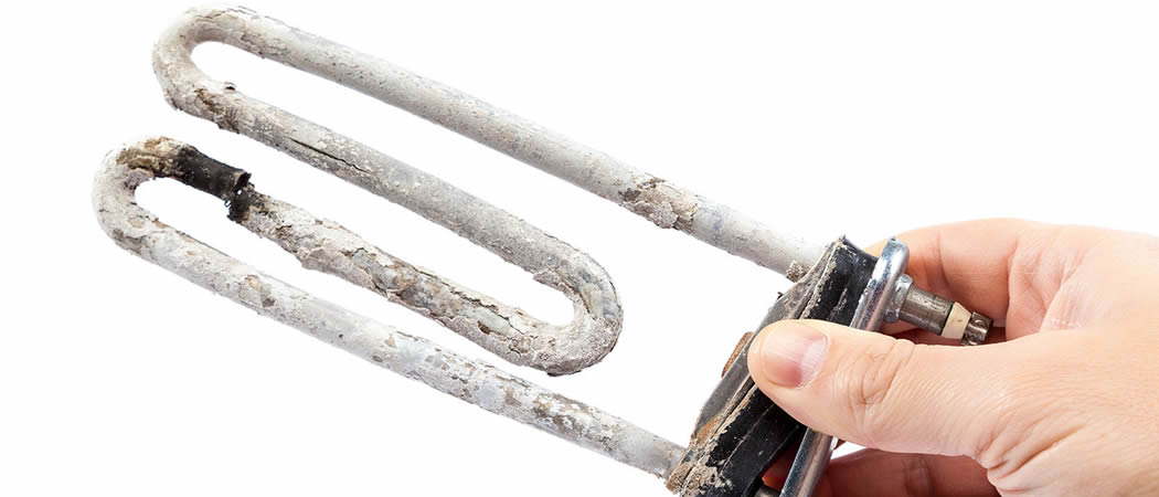 Kalkaanslag-Verwijderen-verkalkte-wasmachine